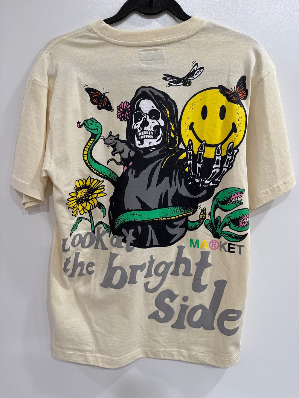 The Market Cream Short-Sleeve Tee with Yellow Smiley Graphic